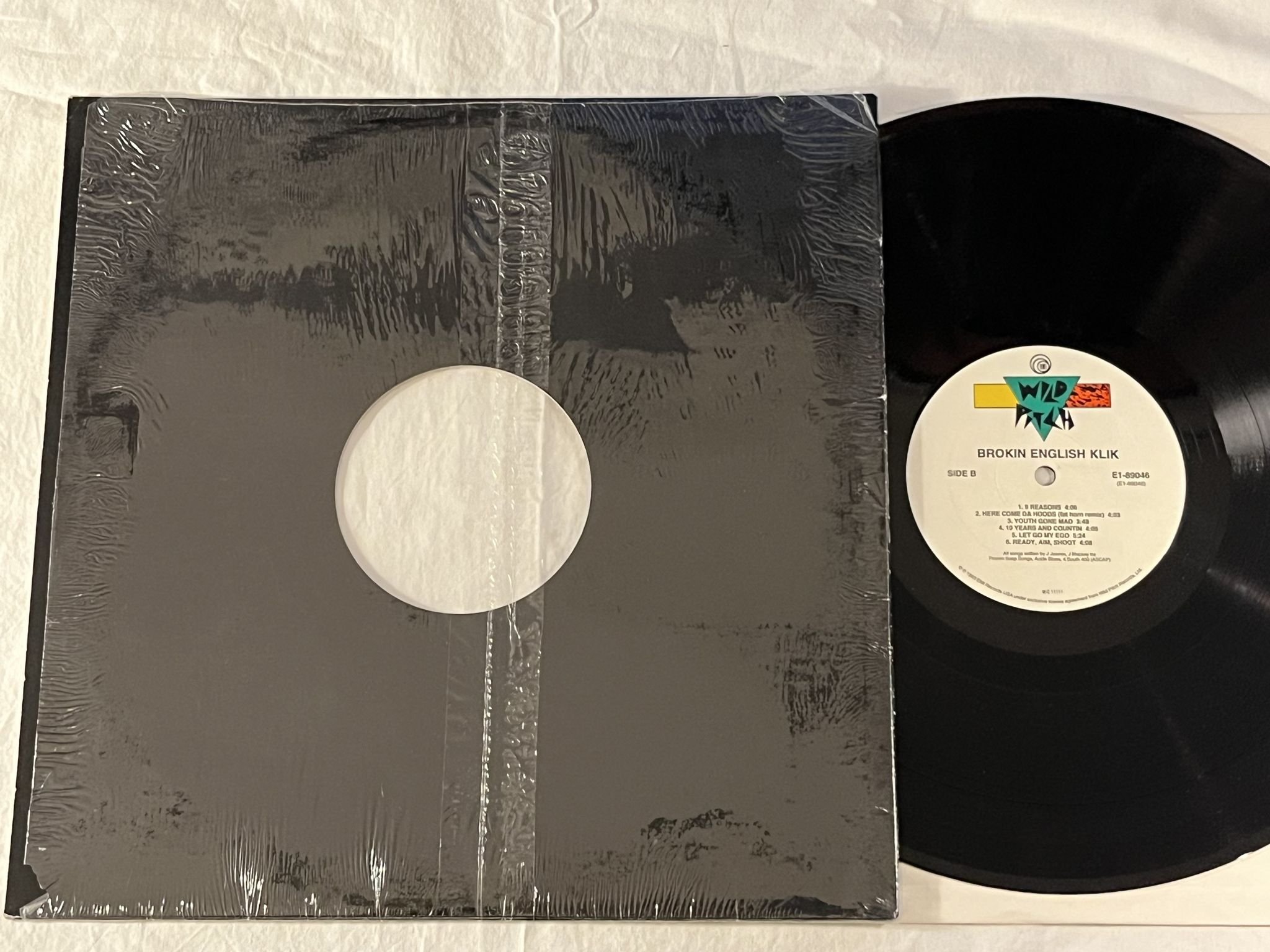 Omslagsbild för skivan BROKEN ENGLISH KLIK s/t LP -93 US WILD PITCH E1-89046