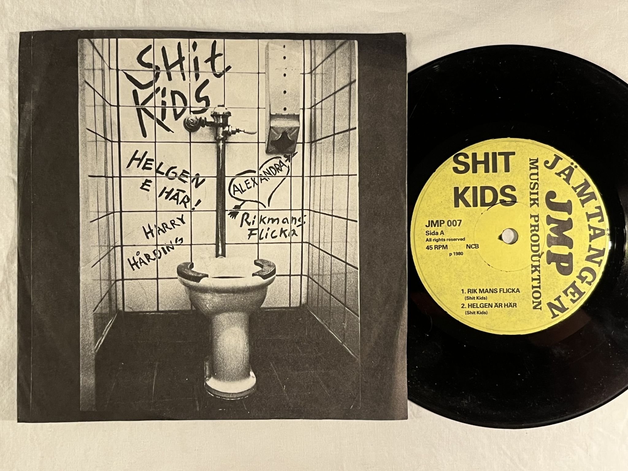 Omslagsbild för skivan SHIT KIDS Rik Mans Flicka 7" Swe -80 JÄMTLÄNGEN MUSIK PROD JMP 007 *** Punk ***