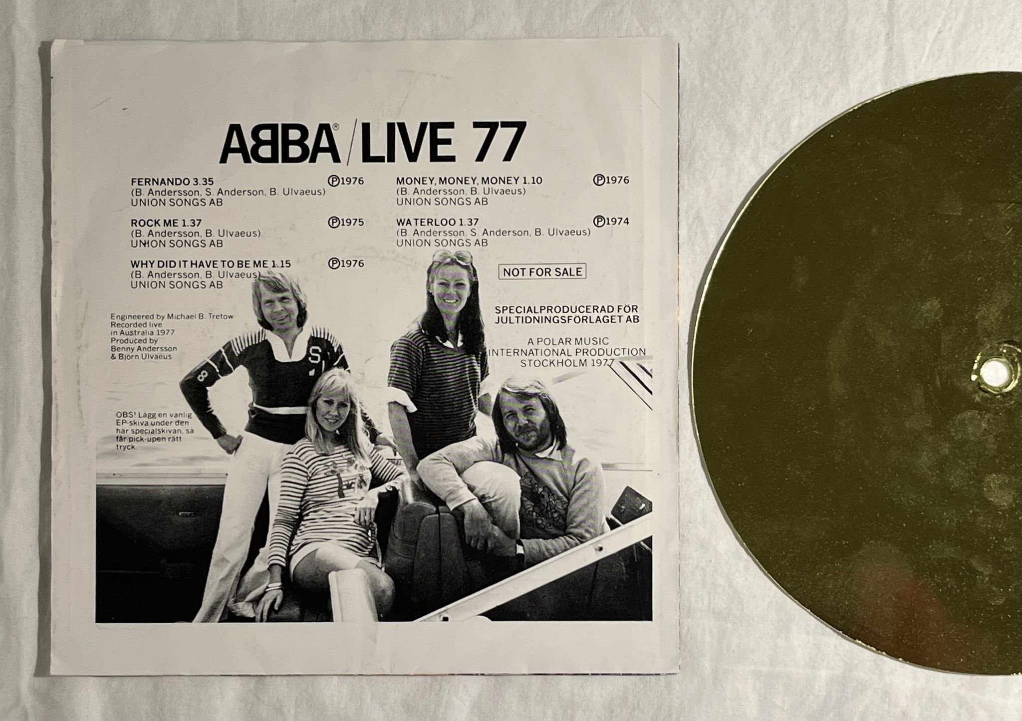 Omslagsbild för skivan ABBA live 77 7" single sided golden flexi-disc Jultidningsförlaget