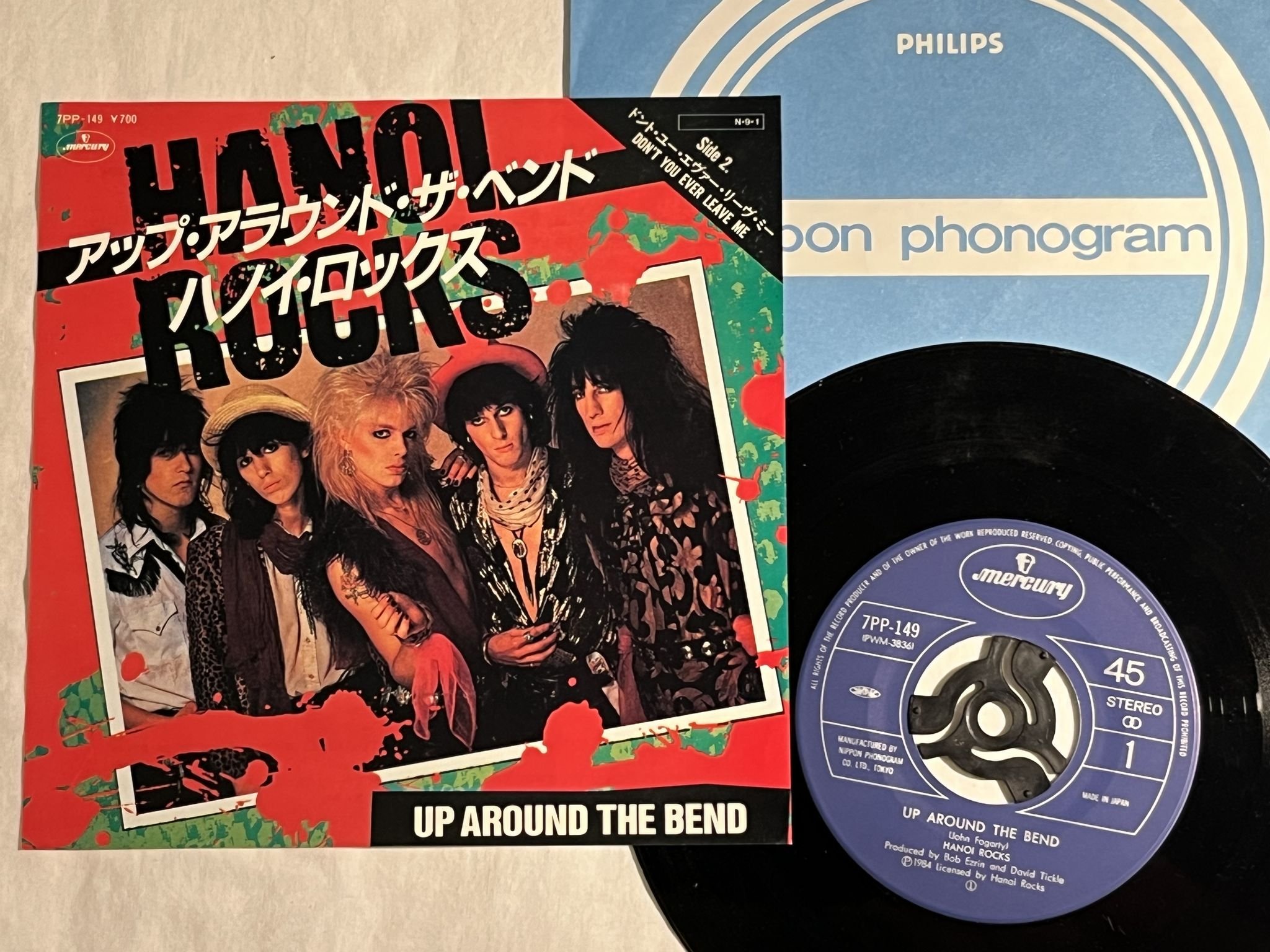 Omslagsbild för skivan HANOI ROCKS Up Around The Bend 7" -84 Japan MERCURY 7PP-149