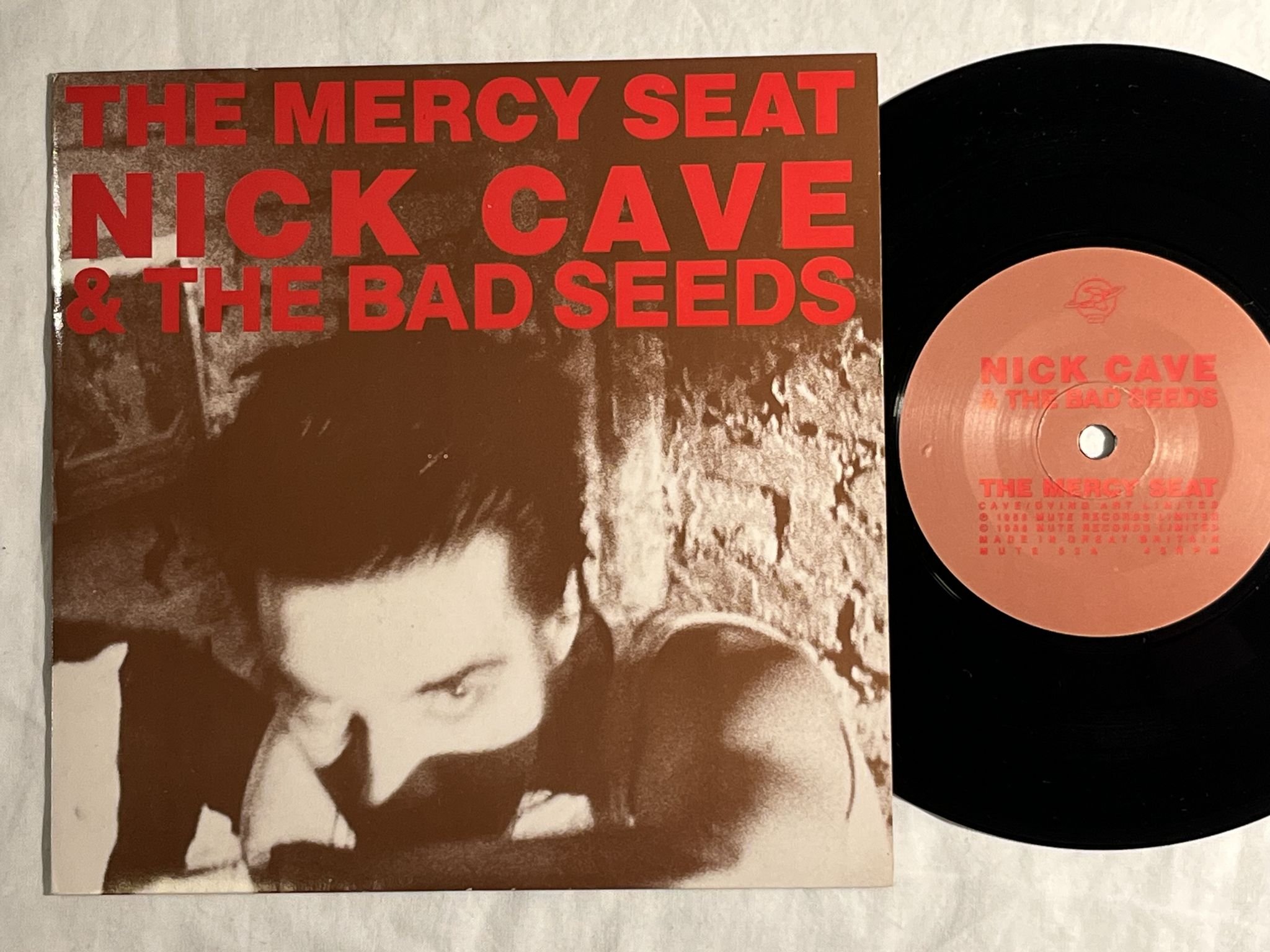 Omslagsbild för skivan NICK CAVE & THE BAD SEEDS The Mercy Seat 7"-88 UK mute 22