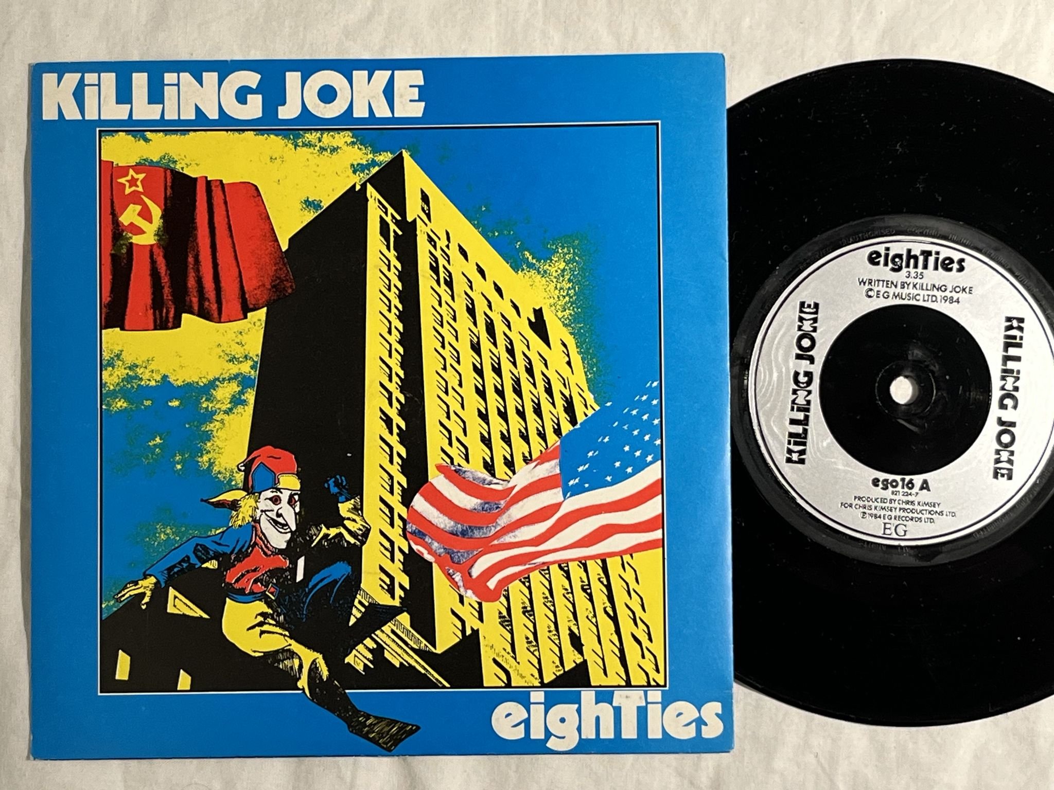 Omslagsbild för skivan KILLING JOKE Eighties 7"-84 UK EG 821224-7